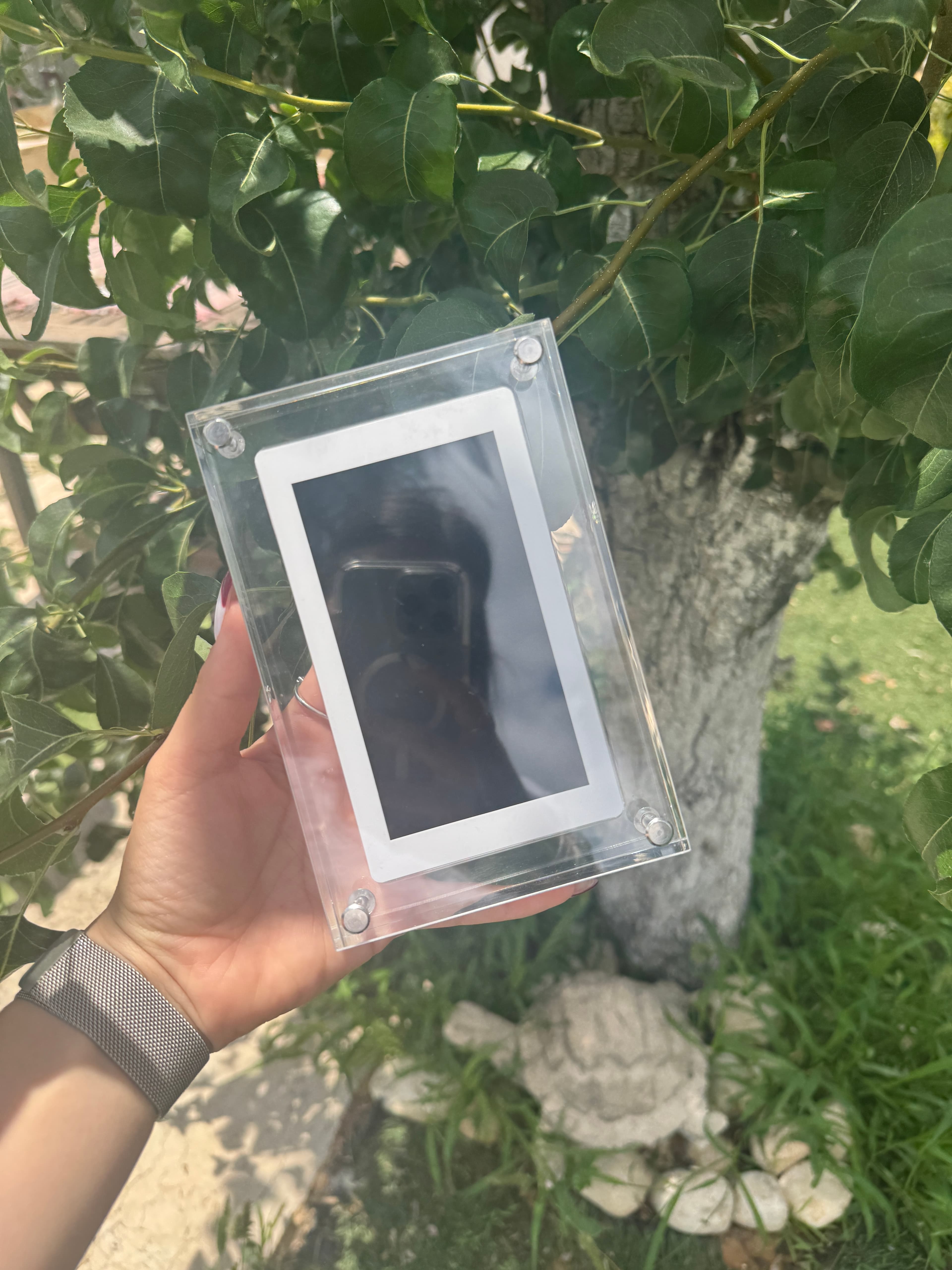 CoupleFrame — held in real life outdoor setting